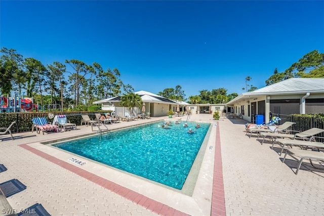 view of pool featuring a patio area