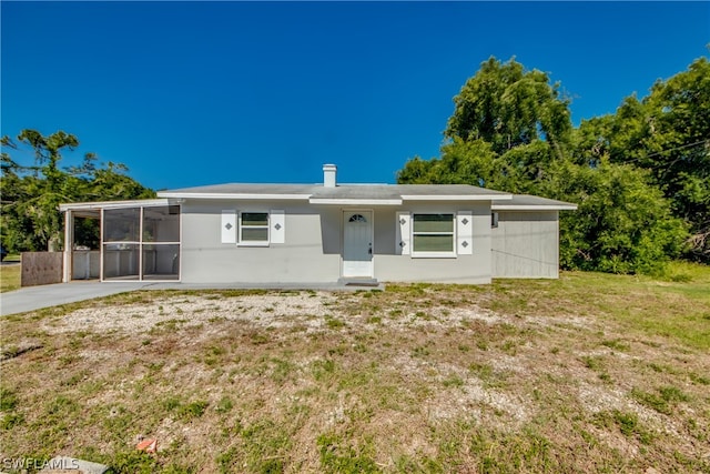 ranch-style home with a front yard