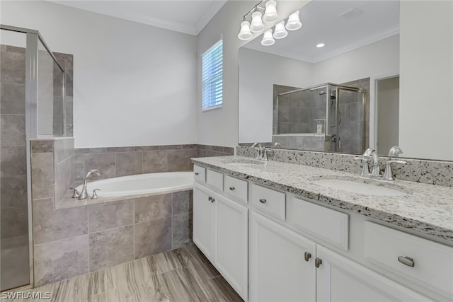 bathroom with crown molding, dual bowl vanity, and plus walk in shower