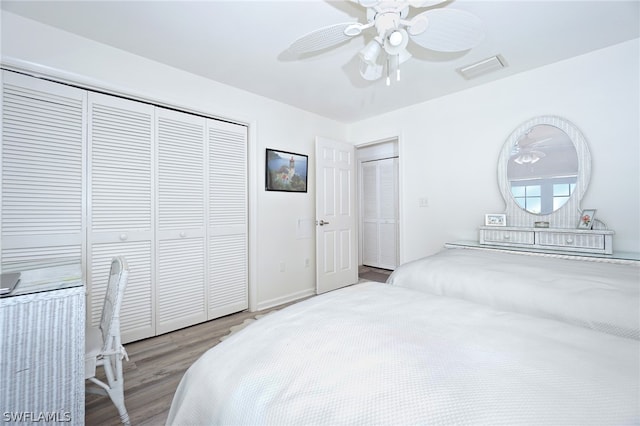 bedroom with ceiling fan and light wood-type flooring