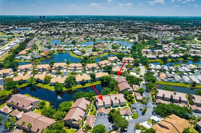 drone / aerial view with a water view