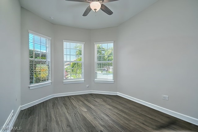 unfurnished room with hardwood / wood-style floors and ceiling fan