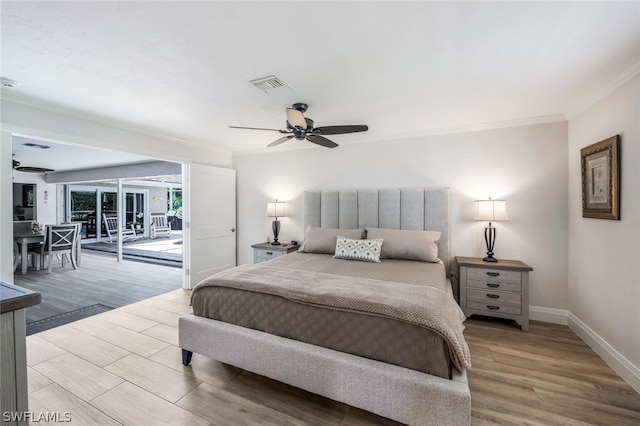 bedroom with ceiling fan, light wood-type flooring, and access to exterior