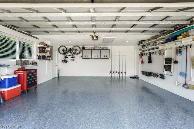 garage featuring a garage door opener