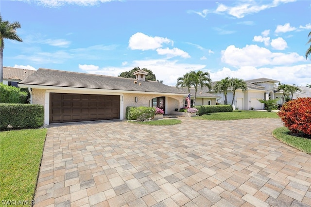 single story home with a garage