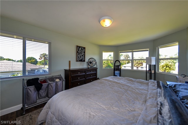 bedroom featuring dark hardwood / wood-style floors