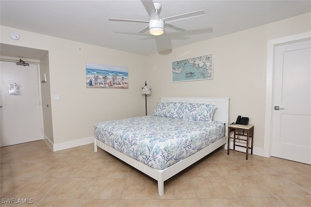 bedroom with tile patterned flooring and ceiling fan