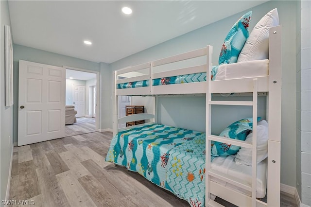 bedroom featuring wood-type flooring