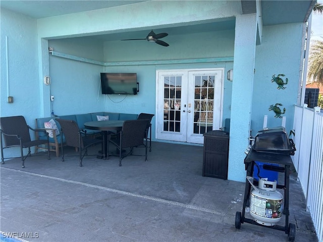 view of patio / terrace with french doors and ceiling fan