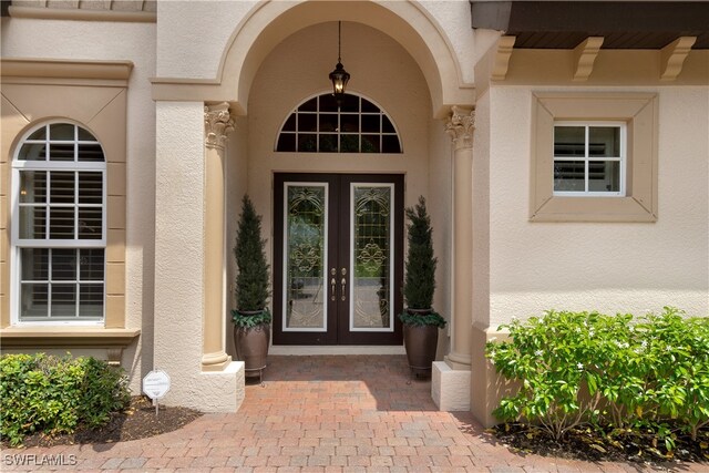 doorway to property with french doors