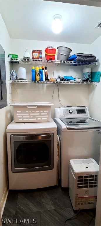 laundry area with separate washer and dryer