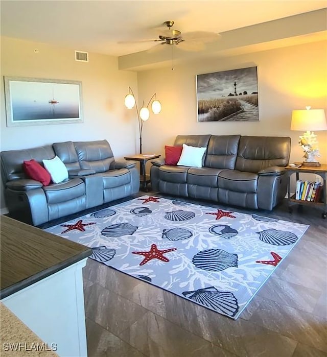 living room featuring dark hardwood / wood-style floors and ceiling fan