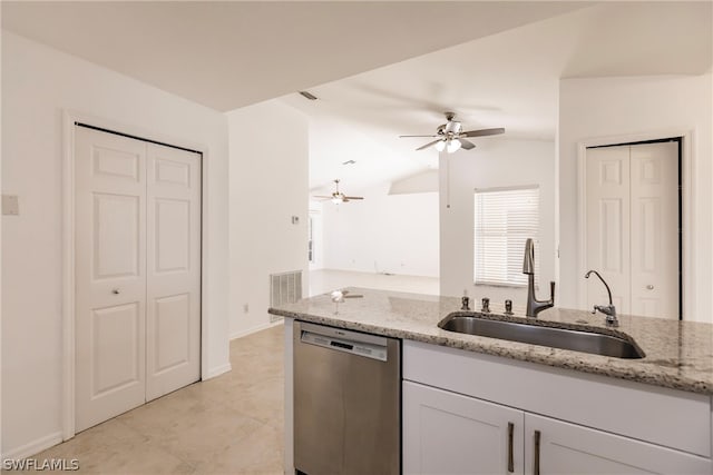 kitchen featuring vaulted ceiling, ceiling fan, light tile flooring, sink, and stainless steel dishwasher