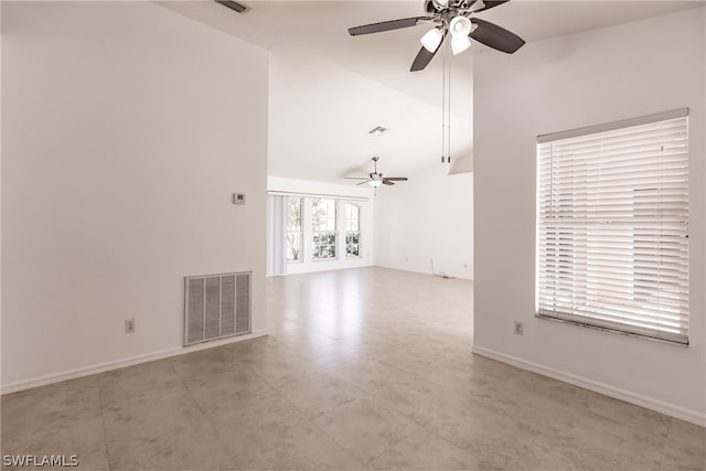 unfurnished room featuring high vaulted ceiling, ceiling fan, and light tile floors