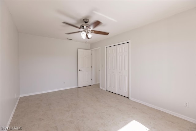 unfurnished bedroom featuring a closet, ceiling fan, and light tile floors