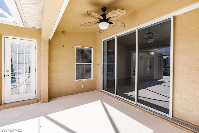 view of patio / terrace featuring ceiling fan