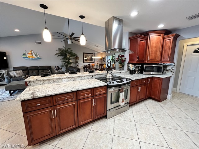 kitchen featuring ceiling fan, decorative light fixtures, lofted ceiling, island range hood, and appliances with stainless steel finishes