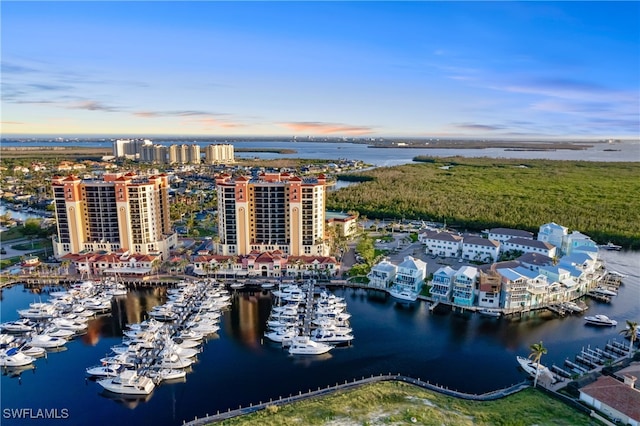 aerial view at dusk with a water view