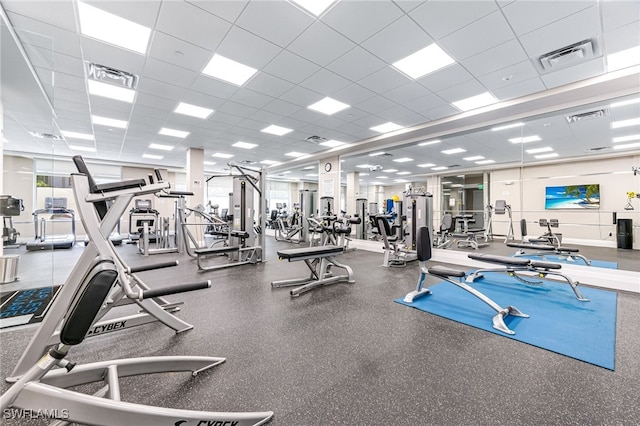 workout area with a drop ceiling