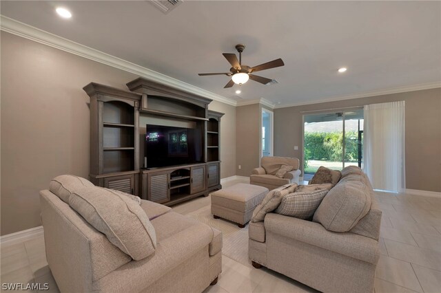 tiled living room with ceiling fan and crown molding