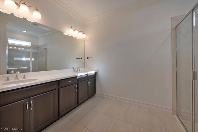 bathroom featuring walk in shower, dual bowl vanity, tile floors, and crown molding