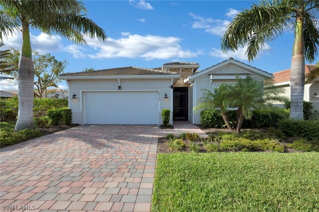 view of front of home with a garage