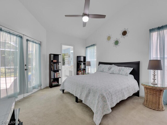 bedroom with multiple windows, ceiling fan, connected bathroom, and carpet flooring