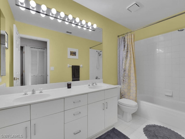 full bathroom featuring tile flooring, toilet, dual vanity, and shower / bathtub combination with curtain