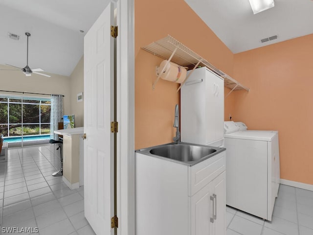 clothes washing area featuring independent washer and dryer, sink, ceiling fan, and light tile floors