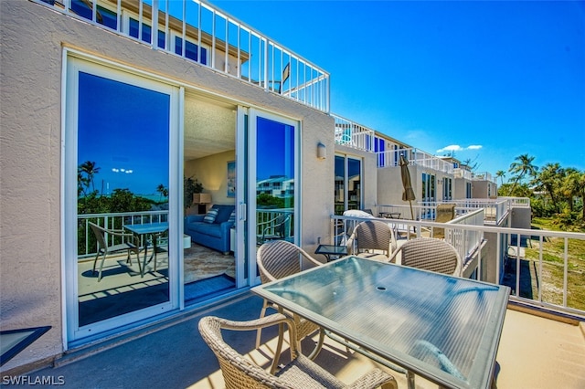 view of patio with a balcony