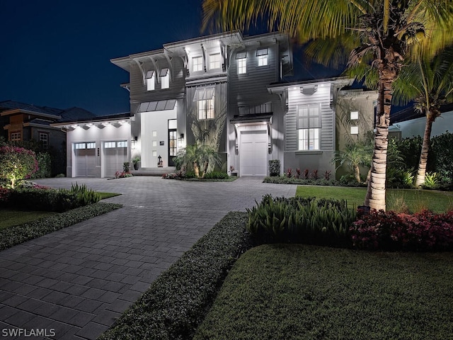 view of front of home featuring a garage