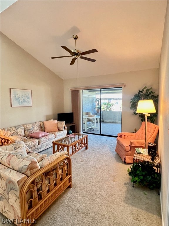 carpeted living room featuring lofted ceiling and ceiling fan