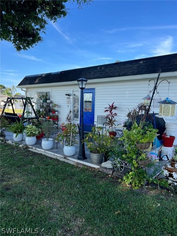 exterior space with a lawn