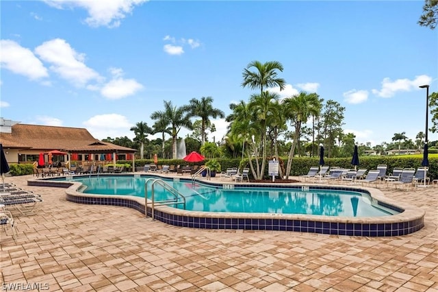 pool with a patio area