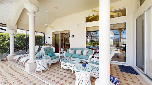 view of patio with ceiling fan and an outdoor living space