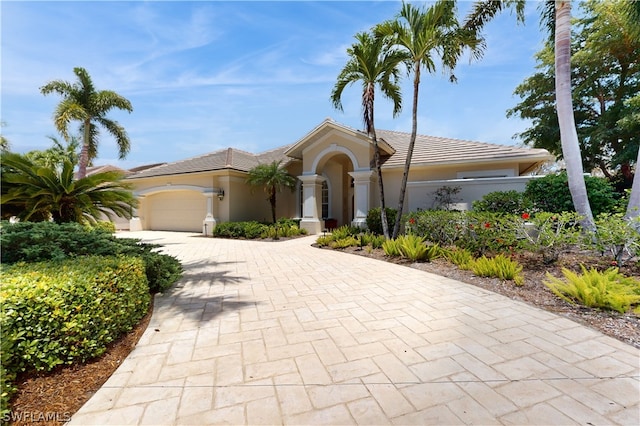 view of front of home with a garage