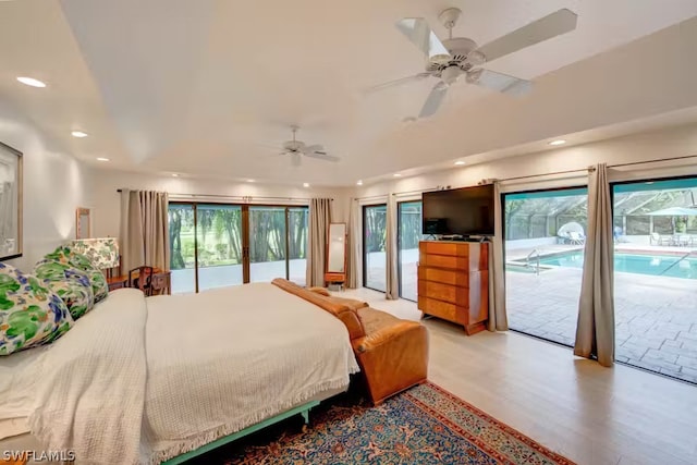 bedroom with light wood-style floors, recessed lighting, a ceiling fan, and access to exterior