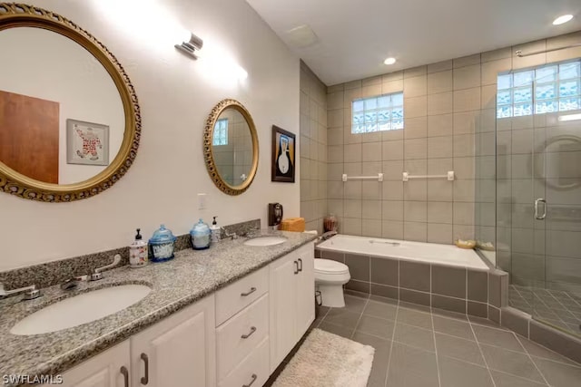 full bath with toilet, tile patterned flooring, a healthy amount of sunlight, a shower stall, and a sink