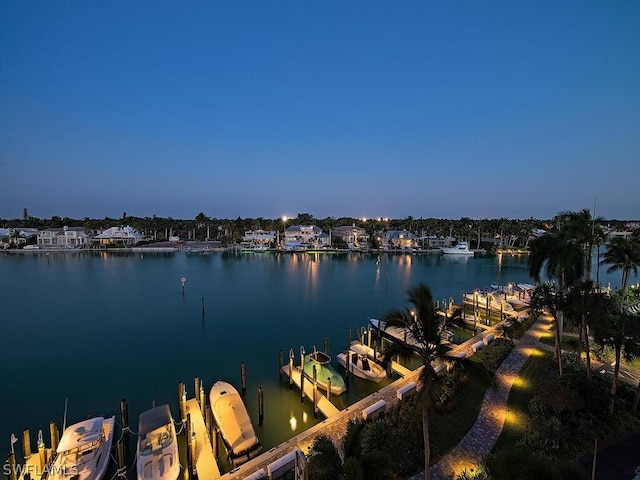 property view of water featuring a boat dock