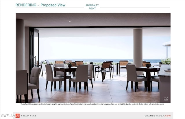 dining area featuring a water view