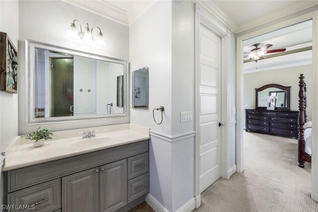 bathroom featuring vanity, ceiling fan, and ornamental molding