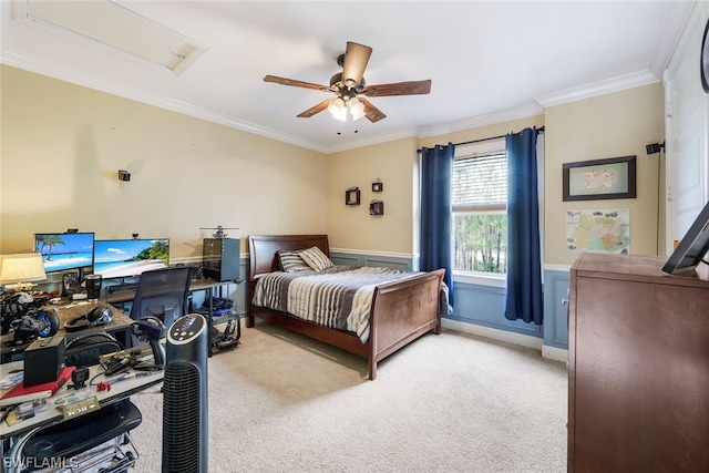 carpeted bedroom featuring ceiling fan and ornamental molding