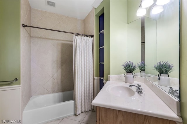 bathroom with tile patterned floors, vanity, and shower / tub combo with curtain