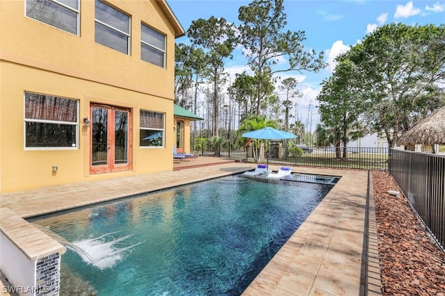 view of swimming pool featuring a patio