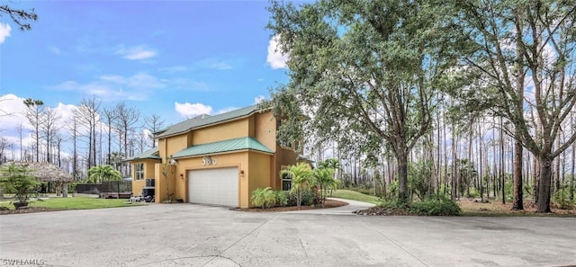 view of home's exterior featuring a garage