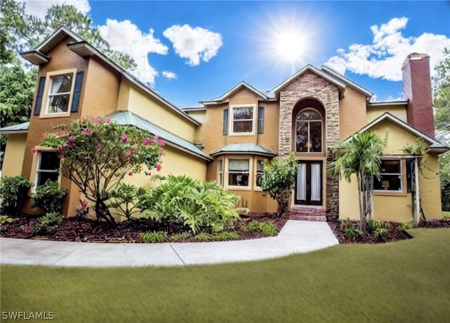 view of front of house featuring a front lawn