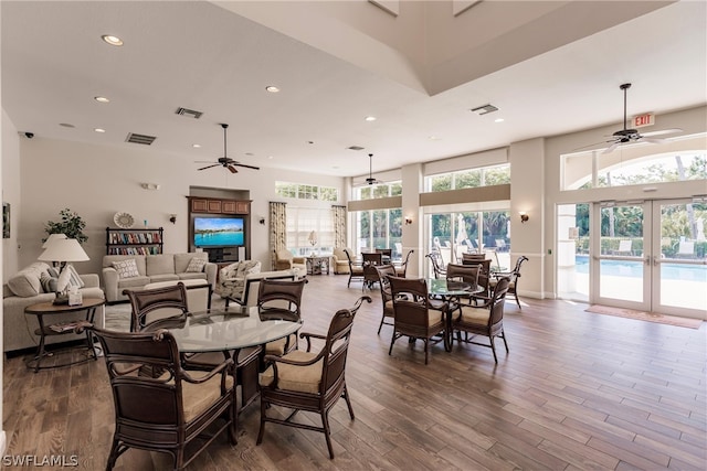 dining area featuring french doors, recessed lighting, visible vents, ceiling fan, and wood finished floors