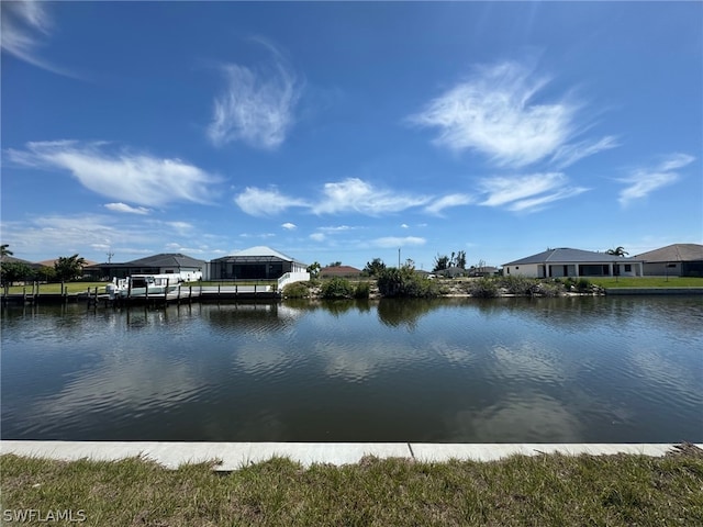 property view of water with a dock