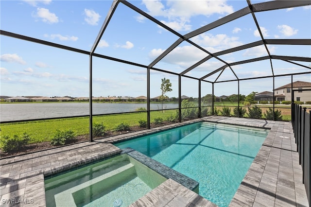 view of pool with a water view and glass enclosure