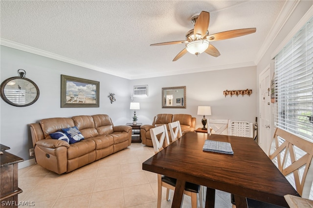 tiled dining area featuring a wall mounted air conditioner, a textured ceiling, ceiling fan, and ornamental molding